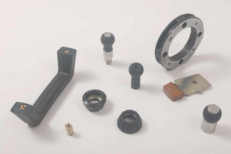 Rubber to metal bonded products